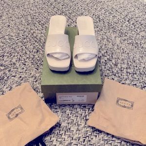 Brand new, never worn, white Gucci Rubber Slides.